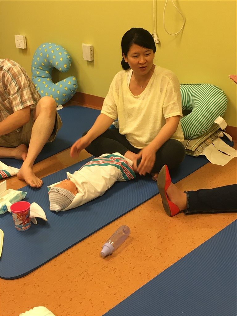 Mom listening in on the birthing class